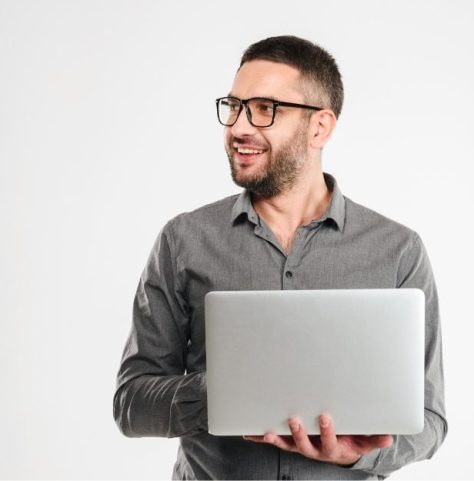 concentrated-businessman-using-laptop-computer-PE3ARHB.jpg